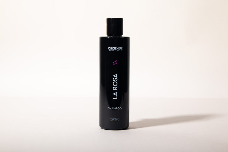 Black shampoo bottle labeled 'La Rosa' on a white background