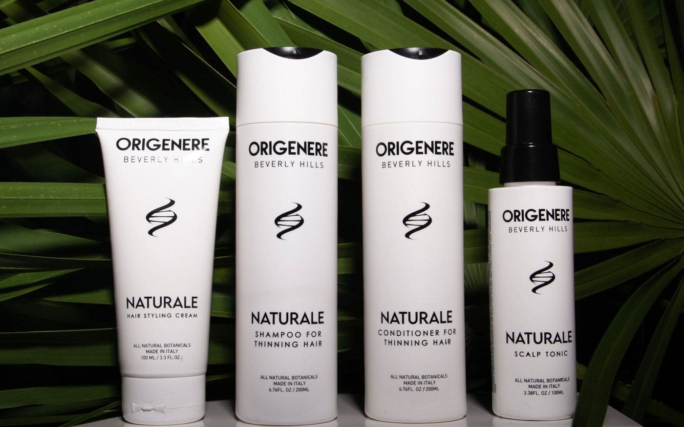 Naturale shampoo, conditioner, scalp tonic and styling cream arranged as a complete routine